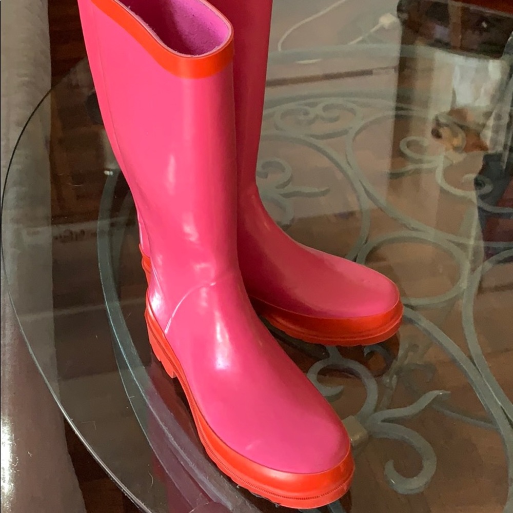 Pink and orange rain boots